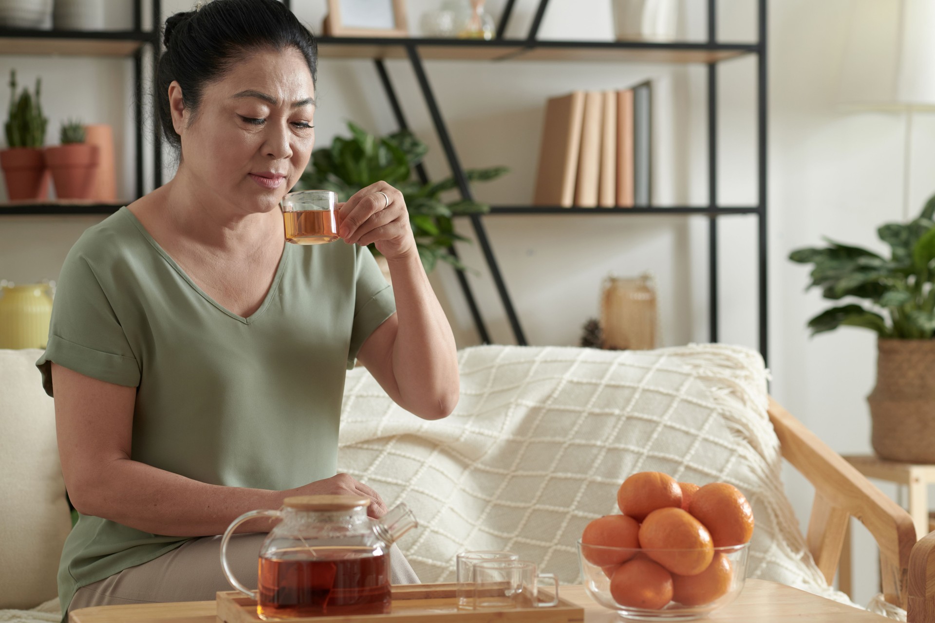 Woman Enjoying Cup of Herbal Tea